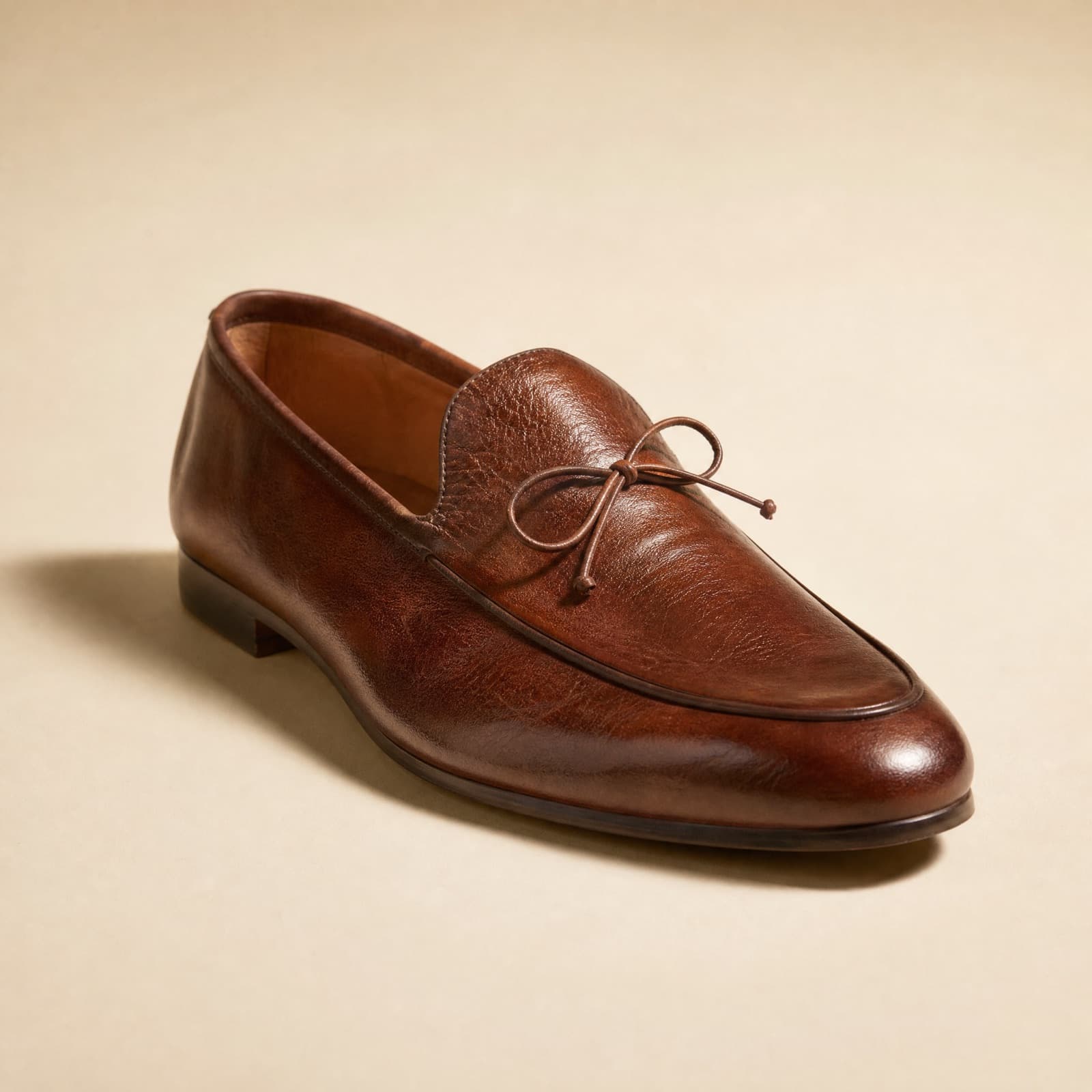 Belgian Loafer — Unstructured. No toe puff, no heel counter stiffener.